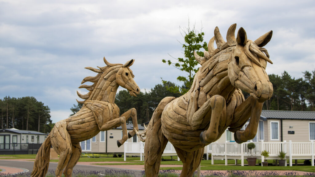 Wooden horse statues in Lakeside park