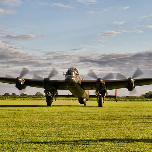 An old aeroplane about to take off from Lincolnshire Aviation centre