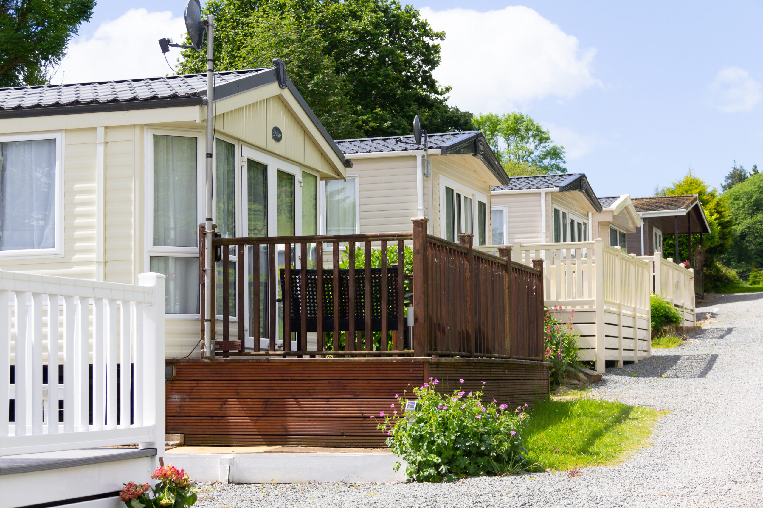 Row of static mobile homes on caravan site