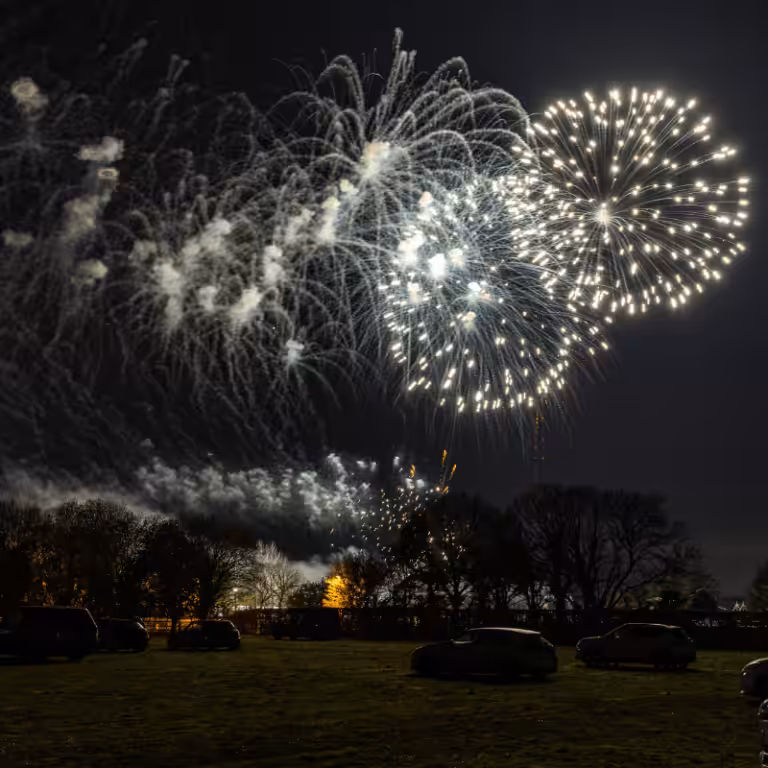 a firework show over a field in lincolnshire